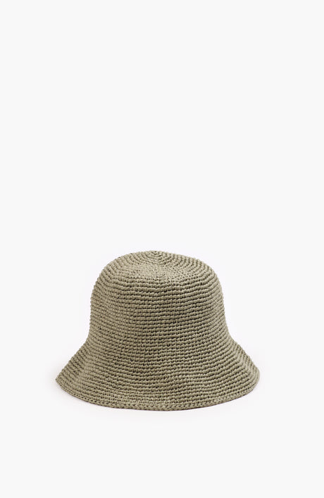a crochet paper sun hat in tarragon colour from Karakoram Accessories shown on white background