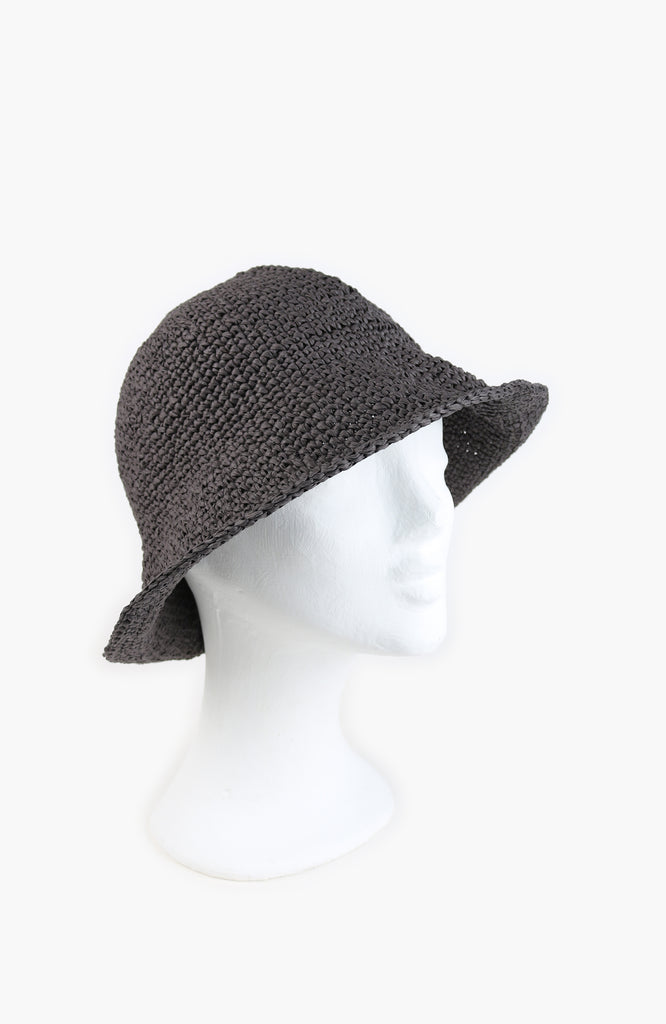 a crochet paper sun hat in charcoal colour from Karakoram Accessories shown on a white mannequin's head viewed from the side